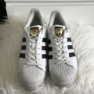 ADIDAS White leather Superstars with Black stripes